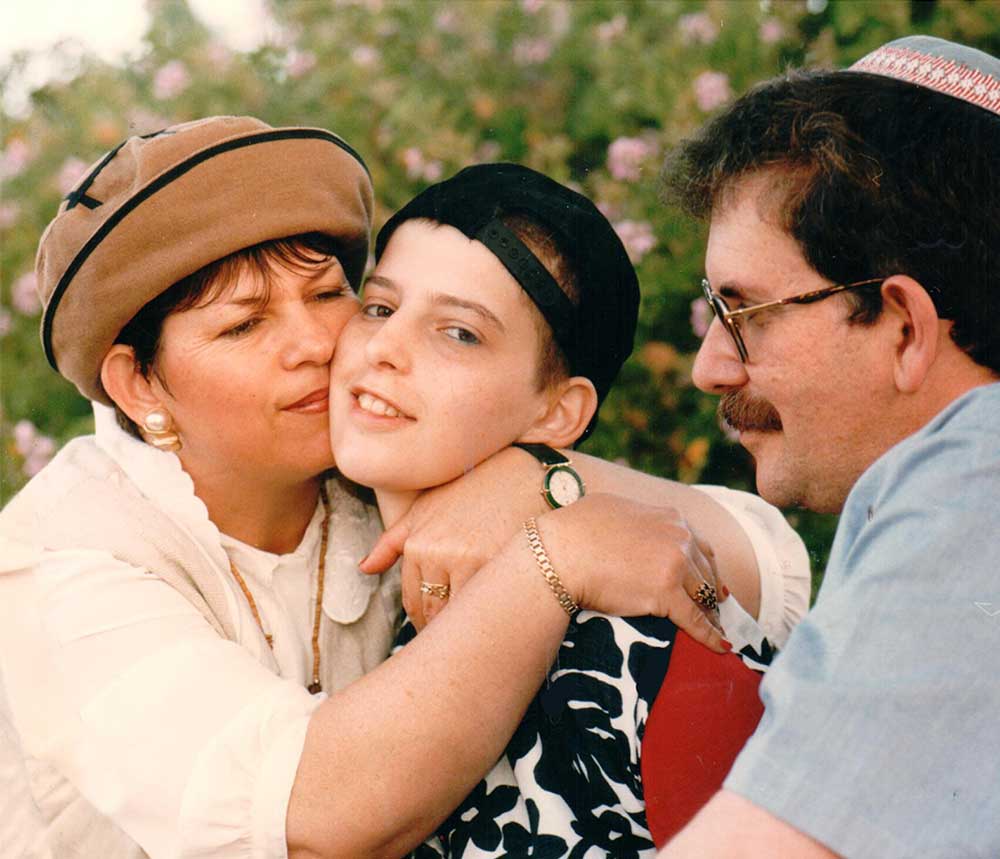 דסי רבינוביץ עם ההורים שלה